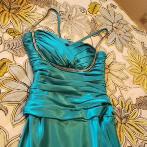 Sexual turquoise blue dress with train and sash